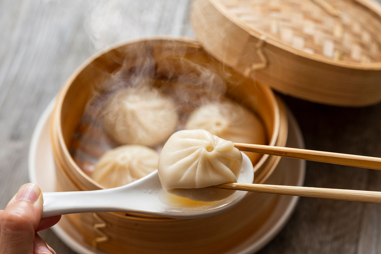 Authentic Chinese cuisine featuring artisanal hand-wrapped xiaolongbao